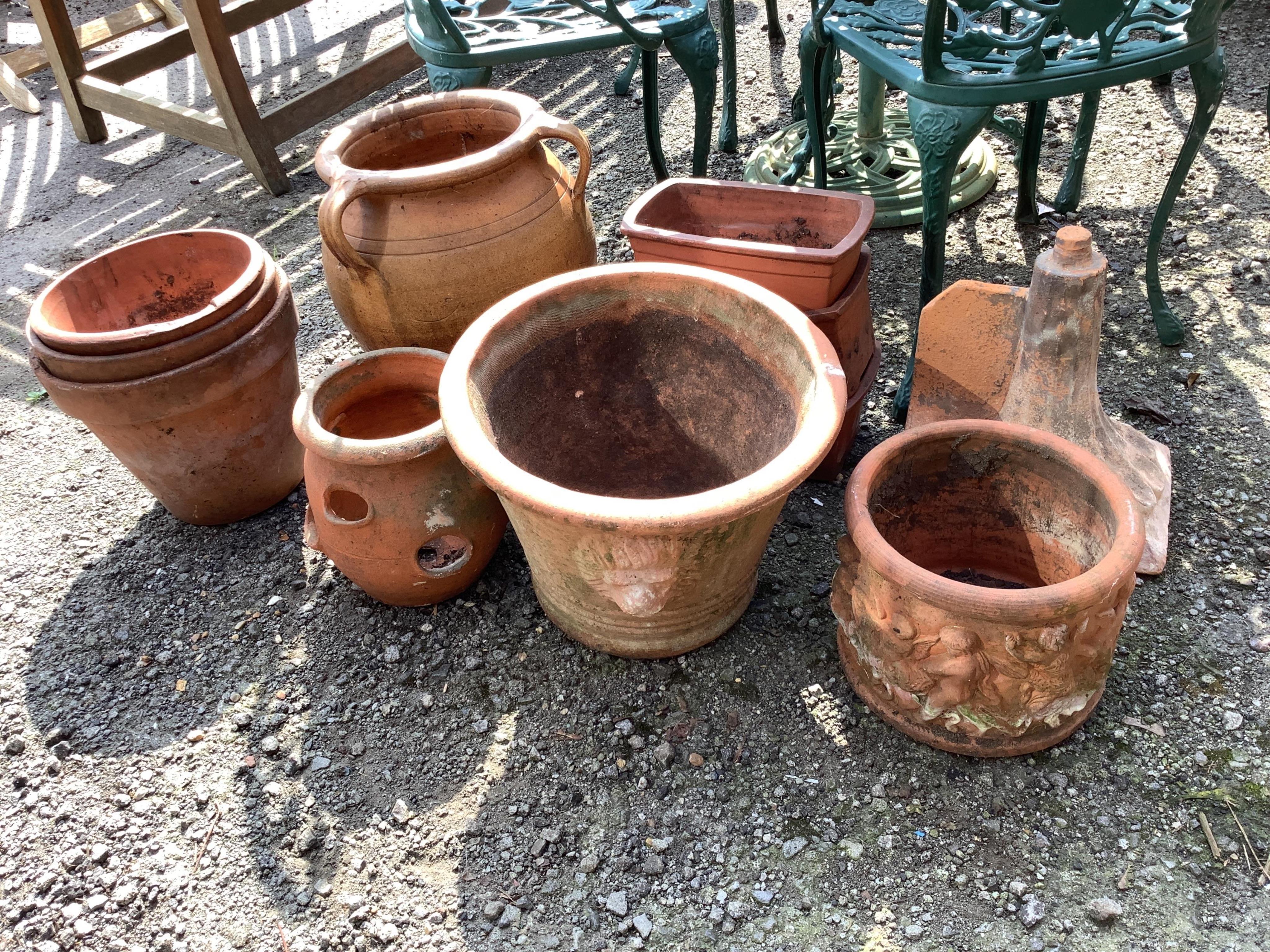 Ten assorted garden pots and planters, largest diameter 40cm, height 31cm together with a decorative ridge tile